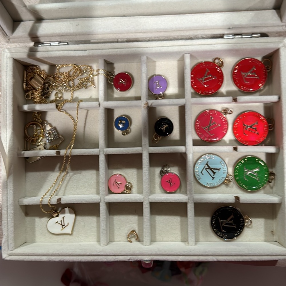 Louis Vuitton authentic pendants and wonderful condition.